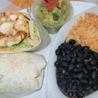 Jumbo Chicken Burrito · Jumbo Chicken Burrito with rice, beans, cheese, lettuce.  All Burritos Served with Sour Crea...