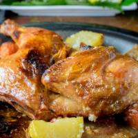 Frarej (Byblos Roasted Chicken) · Half chicken baked with potatoes, carrots, and ripe tomatoes, then basted with lemon, garlic...