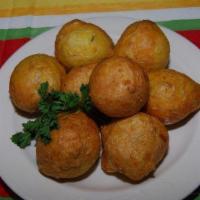 10 Piece Pholourie · Originally from India and made in the Caribbean with split peas and flour; seasoned and frie...