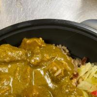 Curry Chicken Dinner(Boneless Breast) · Curry chicken boneless breast, rice & beans or plain rice, cabbage