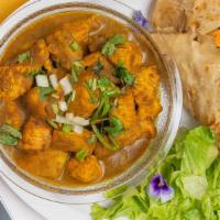 Curry Chicken Roti ( Boneless) · Boneless chicken breast cubes seasoned & marinated with Caribbean herbs & spices, curry & po...