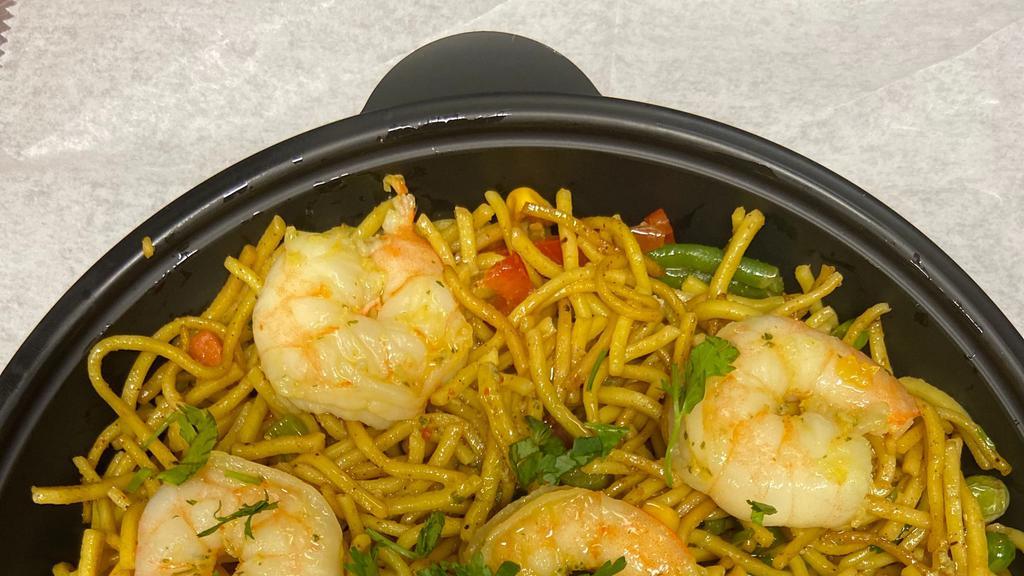 Shrimp Lo Mein · Lo mein soft noodles, sauteed in vegetables, Chinese & Caribbean herbs & spices & shrimp