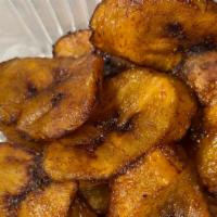 Plantains · Sweet, ripe yellow plantains fried in canola oil.