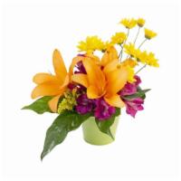 Life In Lilies Flower Arrangement · This lively bouquet is the perfect reminder that life is beautiful! Featuring gorgeous orang...