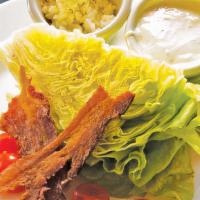 Wedge Salad · Lettuce/ Rosemary feta dressing/ 
Grape tomatoes/Feta cheese/ 
Applewood smoked bacon.