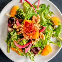 1718 House Salad · Mixed greens/ Lemon and honey balsamic vinagrette/ Candied walnuts/ Blue cheese crumbles/ Pi...