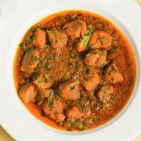 Chicken Tikka Masala · Chicken tikka masala is a dish of chunks of roasted marinated chicken in a spiced curry sauce.