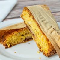 Humintas · Fresh oven baked corn bread with cheese.