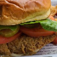 Chicken Sandwich · Generous breaded chicken breast grilled to perfection. Served on a toasted brioche bun. Topp...