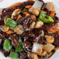 *Hunan Beef · Beef stir fried with onion, bell pepper, and mushroom in spicy brown sauce.