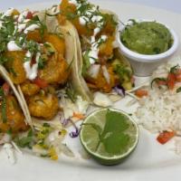 Bang Bang Shrimp Tacos · Succulent shrimp lightly dusted and golden fried. Tossed in our spicy
Bang Bang sauce. Serve...