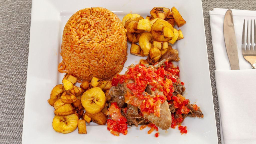 Jellof Rice And Spicy Chicken With Side Plantains   · 