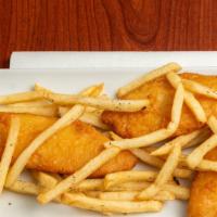 Fish N Chips · Hand Battered and Fried Crisp. Served with French Fries and Tartar Sauce.