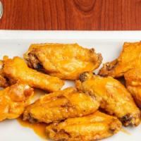 8 Piece Wings · Baked to perfection served in buffalo, BBQ, or mango habanero.