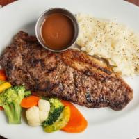 New York Strip 12 Oz · Thick cut, smoky steak full of rich flavor. Served with a choice of freshly made sides.