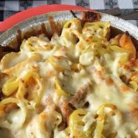 Texas Cheese Fries · a mix of mozzarela and nacho cheese over a bed of fries baked in the oven with bacon bitts a...