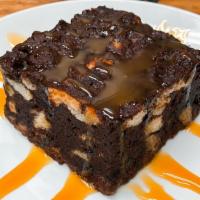 Dark Chocolate Bread Pudding · 68% Pureza chocolate with dark chocolate drizzle