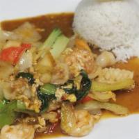 Yellow Curry Seafood Stir Fry · Seafood with scallions, baby bok choy, celery & eggs in a creamy yellow curry sauce.