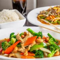 Cashew Stir-Fry · Cashews, carrots, onions, broccoli, & bell peppers in a brown sauce.