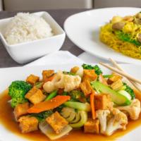 Vegetable Stir-Fry · Your choice of meat (or vegetarian) with mixed vegetables in a brown sauce.