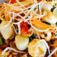 Seafood Phad Thai · Rice noodles stir-fried with a combination of shrimp, scallops, squid, mussels, crab meat, c...