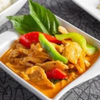 Red Curry · Red curry paste & coconut milk prepared with bamboo, bell peppers, & fresh basil.
