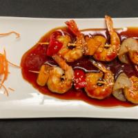  Shrimp Yakitori · Shrimp skewers with teriyaki sauce x2.