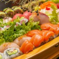 Matsu Boat For Three · 10 pcs chef choice nigin, 15 pcs sashimi, plus California roll, tuna roll green dragon roll,...