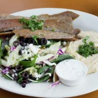 Gyros Plate · A combination of ground beef and lamb slowly roasted on a vertical pit, thinly sliced, and s...