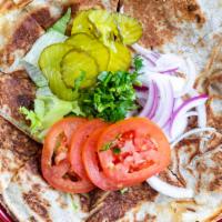 Kafta Arayes · Kafta (ground beef, parsley, and onion) spread over pita bread. Available in spicy. Served w...