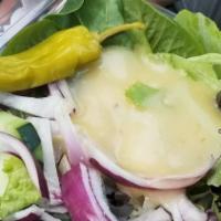 Greek Salad · Field greens, tomatoes, cucumbers, onions, feta cheese, pepperoncini, kalamata olives, house...
