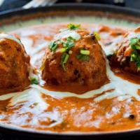 Malai Kofta · Mixed vegetable balls ground with homemade cheese and cooked in a creamy sauce.