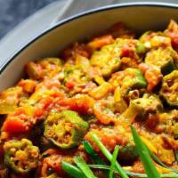 Bendi Masala · Fresh okra cooked with spices and sautÃ©ed with tomatoes and onions.