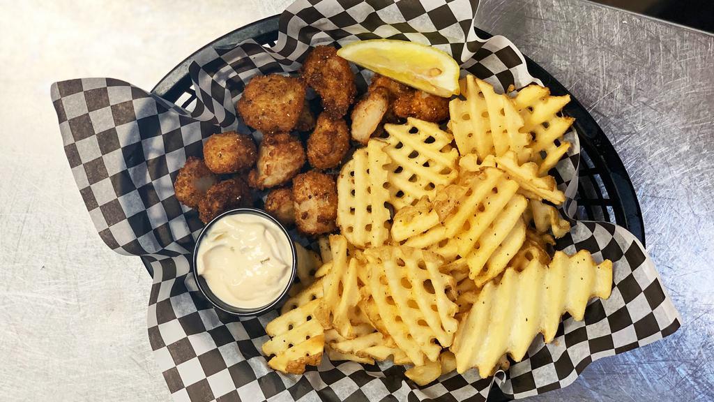 Walleye Nugget Basket · Hand breaded walleye nuggets, with a half-pound of waffle fries. Served with house made tartar sauce.