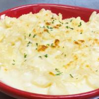 Gouda Mac & Cheese · Sautéed chicken and bacon tossed in our smoked gouda cream sauce with bowtie pasta. Finished...