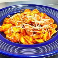 Spicy Italian · Cheese filled tortellini, grilled chicken, pepperoni, andouille sausage and crushed red pepp...