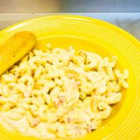 Chick Bacon Mac · Cavatappi noodles, grilled chicken and smoked applewood bacon tossed in our house made beer ...