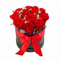 Expression · Consist of 12 Red roses and Baby's Breath in a black round box.
Box size: 7.5