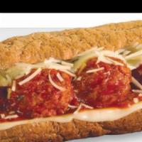 Meatball Parmigiana · Italian beef/pork blended meatballs smothered in a zesty marinara sauce with melted provolon...