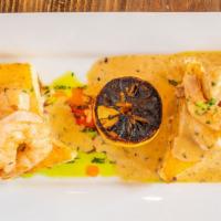 Shrimp & Grits · Served with jalapeño
cheddar grits