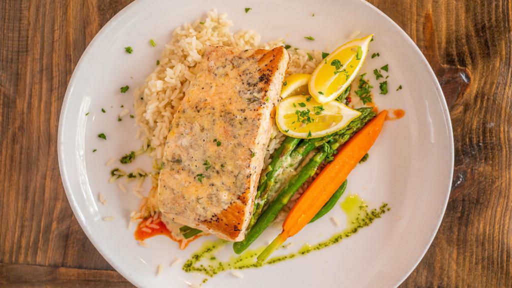 Salmon · Served with rice pilaf &
vegetables of the day