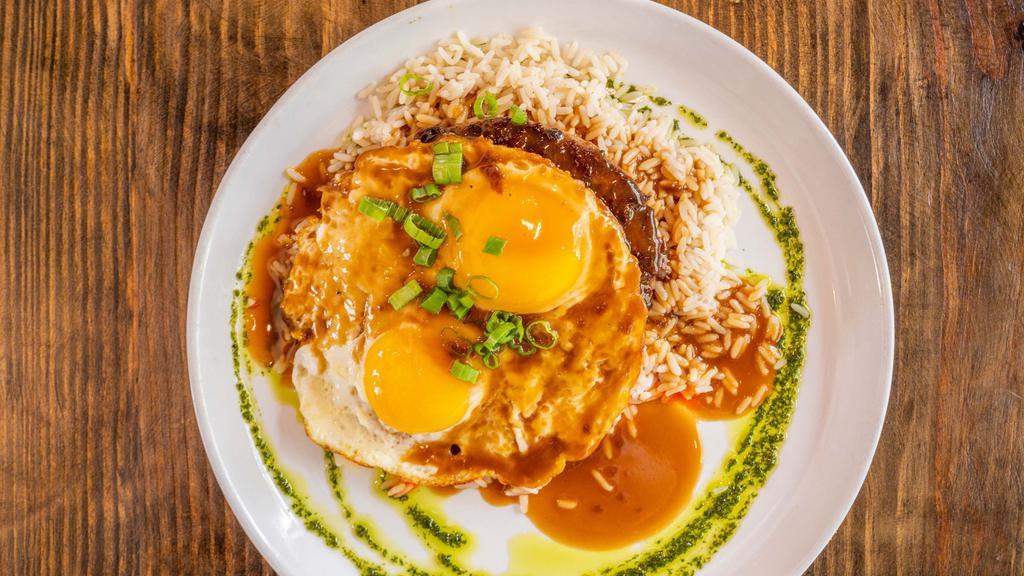 Loco Moco · Two scoops of rice, hamburger
steak & two eggs topped with gravy