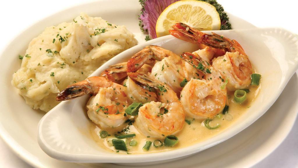Club Scampi · Large gulf shrimp prepared scampi style with garlic, white wine, and creamery butter.