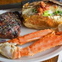 The Club Surf & Turf · Eight oz club angus sirloin grilled, 1/2 pound of sweet, and tender king crab.