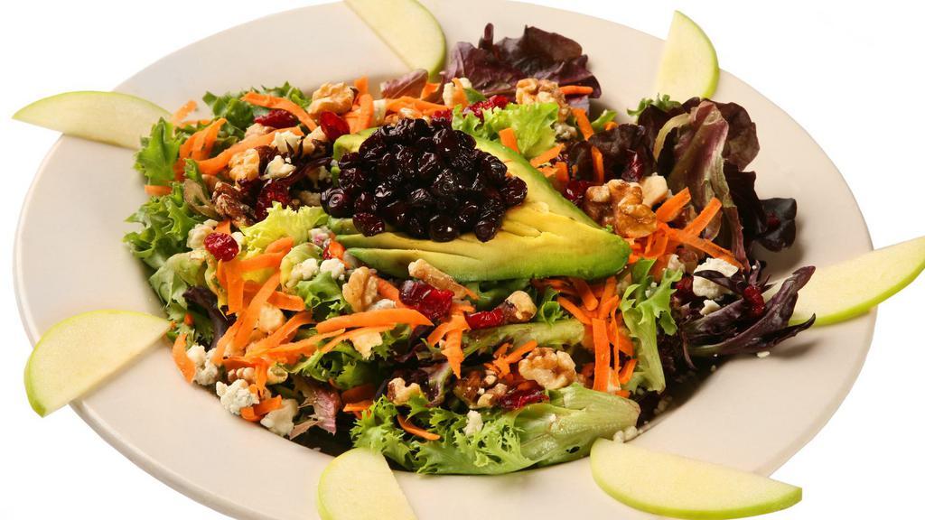 Huckleberry Walnut · Greens, walnuts, dried cranberries, sliced green apples, bleu cheese crumbles, sliced avocado, shredded carrots, and Montana huckleberries. Served with cut green blend and dressings.
