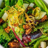 1/2 Mixed Greens Salad · Greens with shaved pears, candied pecans, red grapes, gorgonzola, and crispy leeks with popp...