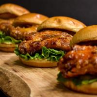 Honey Chicken Sandwich · Toasted Bun, Hand-Battered All Natural Honey Butter Chicken Breast, Lettuce, Pickles, Mayo.