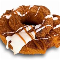 The Churro · Classic crunchy-chewy cake doughnut dipped in cinnamon sugar and drizzled with vanilla frost...