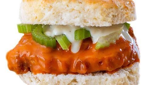 Buffalo Chicken · Chicken tossed in buffalo sauce and topped with diced celery and blue cheese sauce.