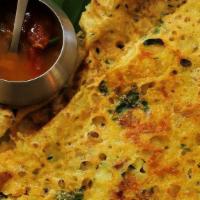 Rava Masala Dosa · Thin crispy wheat and rice crepe stuffed with mildly spiced mashed potatoes and onions. Serv...